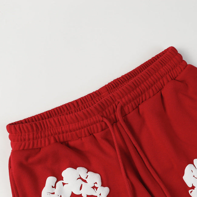 Denim Tears Red Cotton Sweat Shorts With White Textured Flower Wreath Print Main Image